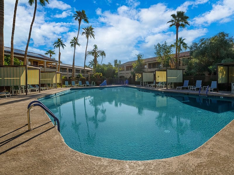 Outdoor Pool and Hot Tub at La Fuente Inn & Suites Hotel, Yuma, Arizona